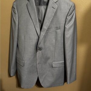 The Modern Groom Three Piece Silver Suit.